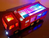 Picture of WolVol Electric Fire Truck Toy with Stunning 3D Lights and Sirens, goes Around and Changes Directions on Contact - Great Gift Toys for Kids