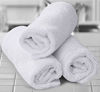 Picture of Utopia Towels Premium Washcloth Set (12 x 12 Inches, White) 600 GSM 100% Cotton Face Cloths, Highly Absorbent and Soft Feel Fingertip Towels (12-Pack)