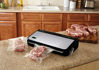 Picture of FoodSaver FM2435 Vacuum Sealer Machine with Bonus Handheld Sealer and Starter Kit | Safety Certified | Silver