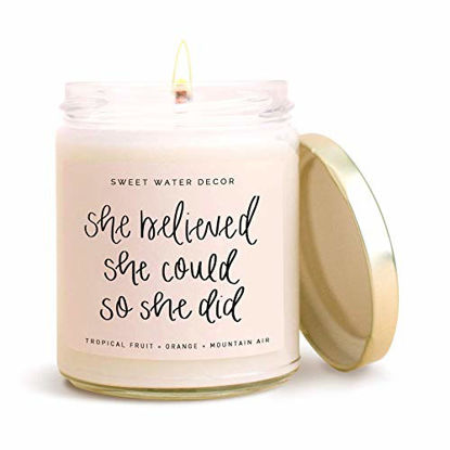 Picture of Sweet Water Decor, She Believed She Could So She Did, Tropical Fruit, Orange, Mountain Air, and Island Scented Soy Wax Candle for Home | 9oz Clear Glass Jar, 40 Hour Burn Time, Made in the USA