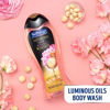 Picture of Softsoap Luminous Oils Moisturizing Body Wash Shower Gel, Macadamia Oil and Peony - 20 fluid ounce (4 Pack)