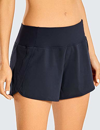 Picture of CRZ YOGA Women's Quick-Dry Athletic Sports Running Workout Shorts with Zip Pocket - 4 Inches Navy 4''-R403 X-Large