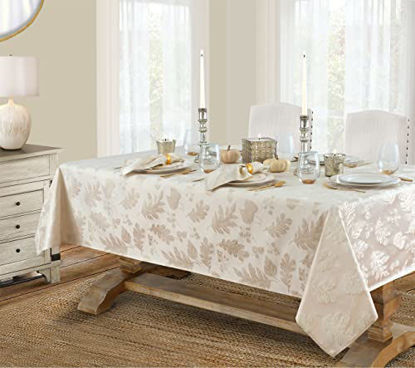 Picture of Newbridge Metallic Autumn Leaf Damask Thanksgiving Fabric Tablecloth, Fall Swirling Leaves, Soil Resistant Easy Care Tablecloth, 60 x 84 Oblong/Rectangle, Ivory/Gold