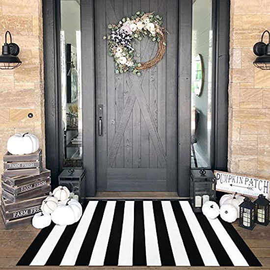 https://www.getuscart.com/images/thumbs/0873923_kozyfly-black-and-white-striped-rug-472x708-inches-black-area-rug-4-x-6-cotton-hand-woven-washable-o_550.jpeg