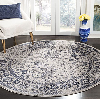 Picture of SAFAVIEH Adirondack Collection ADR109P Oriental Distressed Non-Shedding Dining Room Entryway Foyer Living Room Bedroom Area Rug, 6' x 6' Round, Grey / Navy