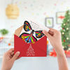 Picture of heytech Christmas Magic Wind Up Flying Great Surprise Gift Butterfly in The Book Rubber Band Powered Magic Fairy Flying ,Christmas Cards Great Surprise Gift (15 Packs)