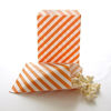 Picture of Orange Party Goody Bags (100 Pack) - Fall Birthday or Autumn Wedding Favors - Halloween Candy Buffet Paper Bags