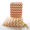 Picture of Orange Party Goody Bags (100 Pack) - Fall Birthday or Autumn Wedding Favors - Halloween Candy Buffet Paper Bags