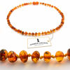 Picture of Amber Teething Necklace for Babies - Anti Inflammatory, Drooling and Teething Pain Reducing Natural Remedy - Made of Highest Quality Certified Baltic Amber - Perfect Baby Shower Gift - (Honey)