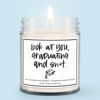 Picture of Look at You, Graduating Candle - Funny Graduation Gift - Cake + Sprinkles Scent - Natural Scented Soy + Coconut Blend Wax with Cotton Wick - Made in the USA - 8 oz