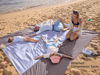 Picture of WEKAPO Beach Blanket Sandproof, Extra Large Oversized 10'X 9' for 2-8 Person Beach Mat, Big & Compact Sand Free Mat Quick Drying, Lightweight & Durable with 6 Stakes & 4 Corner Pockets