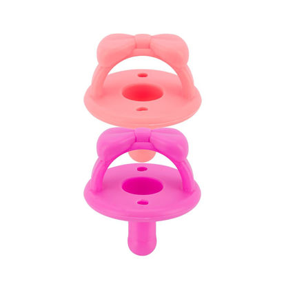 Picture of Itzy Ritzy Sweetie Soother Pacifier Set of 2 - Silicone Newborn Pacifiers with Collapsible Handle & Two Air Holes for Added Safety; Set of 2 in Guava/Dragon Fruit, Ages Newborn & Up