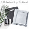 Picture of 200 Black & Silver Bags for Small Business 100 Black and 100 Silver 1.5Mil 9"x12" Merchandise Bags Thick Glossy Retail Bags and Shopping Bags For Small Business with Die Cut Handles Boutique Bags