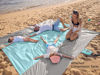 Picture of WEKAPO Beach Blanket Sandproof, Extra Large Beach Mat, Big & Compact Sand Free Mat Quick Drying, Lightweight & Durable with 6 Stakes & 4 Corner Pockets