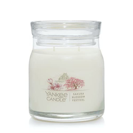 Picture of Yankee Candle Sakura Blossom Festival Scented, Signature 13oz Medium Jar 2-Wick Candle, Over 35 Hours of Burn Time