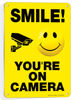 Picture of iSYFIX Smile You're on Camera Signs for Business - 1 Pack 7x10 Inch - 100% Rust Free .040 Aluminum Sign, Laminated for UV, Weather, Fade Resistance, Security Camera Sign for Home, Business, CCTV