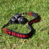 Picture of USA GEAR TrueSHOT Neck Strap Neoprene Camera Straps - Padded Camera Strap, Pockets, and Quick Release Buckles - Compatible with Canon, Nikon, Sony and More DSLR and Mirrorless Cameras (Red Plaid)