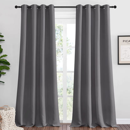Picture of NICETOWN Bedroom Blackout Curtains Panels - Triple Weave Energy Saving Thermal Insulated Solid Grommet Blackout Draperies for Patio (1 Pair, 55 inches by 90 Inch, Grey)