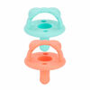 Picture of Itzy Ritzy Sweetie Soother Pacifier Set of 2 - Silicone Newborn Pacifiers with Collapsible Handle & Two Air Holes for Added Safety; Set of 2 in Aquamarine & Peach, Ages Newborn & Up