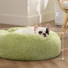 Picture of Bedsure Calming Dog Bed for Small Dogs - Donut Washable Small Pet Bed, Round Anti Anxiety Fluffy Plush Faux Fur Large Cat Bed, Fits up to 25 lbs Pets, Green, 23 inches