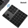 Picture of Denpetec Wireless Bluetooth Numeric Keypad,Rechargeable Portable External Number Pad with 34 Keys for PC Laptop,Compatible with Windows Android iOS System(Black)