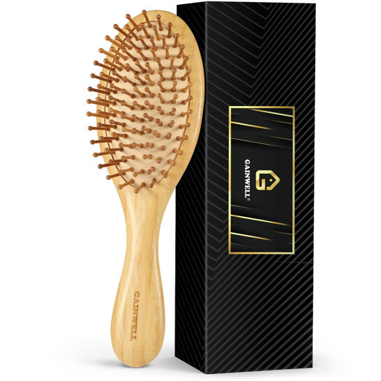 Picture of GAINWELL Bamboo Hair Brush for Hair Growth, Natural Bamboo Bristles Detangling Wooden Paddle Hairbrush for Massaging Scalp, for Women Men and Kids, for All Hair Types, with Ergonomic handle