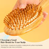 Picture of GAINWELL Bamboo Hair Brush for Hair Growth, Natural Bamboo Bristles Detangling Wooden Paddle Hairbrush for Massaging Scalp, for Women Men and Kids, for All Hair Types, with Ergonomic handle