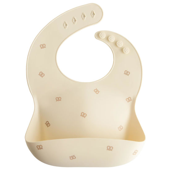 Picture of mushie Silicone Baby Bib | Adjustable Fit Waterproof Bibs (Pretzel)