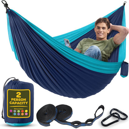 Picture of Durable Hammock 500 lb Capacity, Nylon Camping Hammock Chair - Double or Single Sizes w/Tree Straps and Attached Carry Bag - Portable for Travel/Backpacking/Beach/Backyard (Large, Blue & Light Blue)