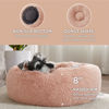 Picture of Bedsure Calming Dog Bed for Small Dogs - Donut Washable Small Pet Bed, 23 inches Anti-Slip Round Fluffy Plush Faux Fur Large Cat Bed, Fits up to 25 lbs Pets, Pink