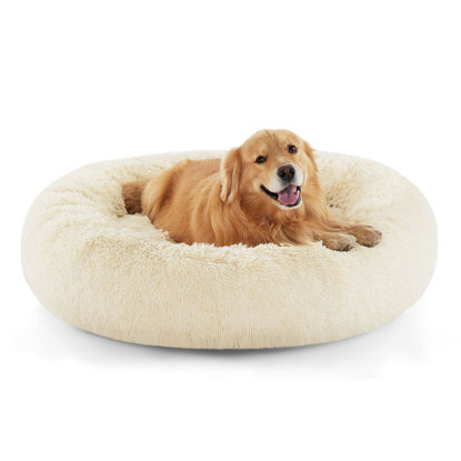 Picture of Bedsure Calming Dog Bed for Extra Large Dogs - Donut Washable Large Pet Bed, Anti-Slip Round Fluffy Plush Faux Fur Dog Bed, Fits up to 125 lbs Pets, Oat Milk, 45 inches