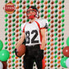 Picture of LOLStar Superbowl Party Decorations 2024, 5 Pack Football Shaped Foil Fringe Curtains, 3.3x6.6 ft Green and Brown Photo Booth Props, Football Backdrop for Superbowl Birthday Party Supplies