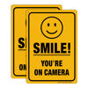 Picture of (2 Pack) Smile You're On Camera Video Surveillance Sign - 10 x7 Inches .040 Rust Free Heavy Duty Aluminum - Indoor or Outdoor Use for Home Business CCTV Security Camera,UV Protected & Reflective