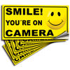 Picture of iSYFIX Smile You're on Camera Stickers for Business - 6 Pack 4x2 Inch - Self-Adhesive Vinyl Decal, Laminated for Ultimate UV Protection, Fade Resistance, Security Camera Sign for Home, Business, CCTV