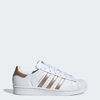 Picture of adidas womens Superstar fashion sneakers, Cloud White Copper Metallic Core Bla, 10.5 US - Size: 10.5